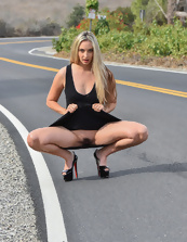 Porn pics of blonde girl flashing slender body on the road