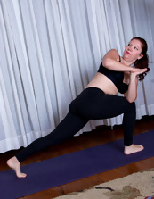 Mature sportswoman shows excited holes after yoga session