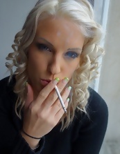 Blonde mom from Czech smokes a cigarette and shows breasts