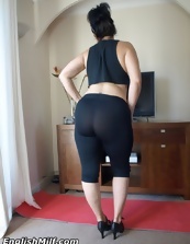 Black-haired housewife during yoga shows her sexy milf ass