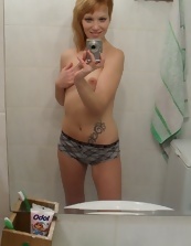 Nice mom undresses and takes nude selfies in the bathroom