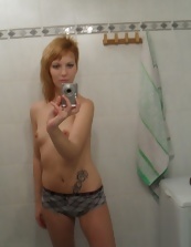 Nice mom undresses and takes nude selfies in the bathroom