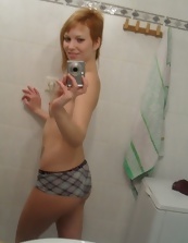 Nice mom undresses and takes nude selfies in the bathroom