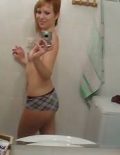 Nice mom undresses and takes nude selfies in the bathroom