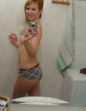 Nice mom undresses and takes nude selfies in the bathroom