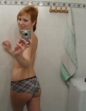 Nice mom undresses and takes nude selfies in the bathroom