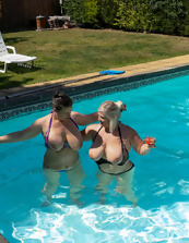 Mature friends spend a good time showing big tits in the pool