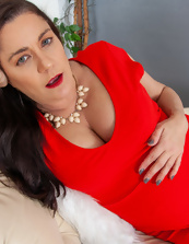 Classy mature taking off red dress with intention to masturbate