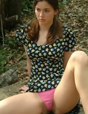 Nice upskirt pics of lovely teen flashing her bush outdoors