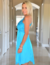 Pics of blond MILF with big tits taking off blue dress