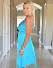 Pics of blond MILF with big tits taking off blue dress