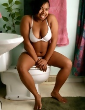 Chubby black mom happily demonstrates her sexy bush