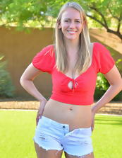 Outdoor pics of joyful blonde mom showing her assets