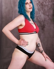 Blue-haired mom shows her hairy cunny in solo pics