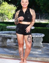 Outdoor pics of tattooed Asian mature with hairy cunny