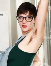 Pregnant mom with glasses displays bush in solo pics