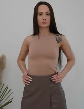 Skirt wearing Euro girl decides to stirp naked