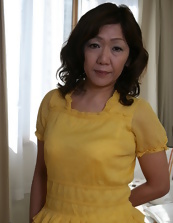 A mature woman from Asia looking seductive and horny