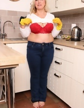 Mature blonde playing in the kitchen MILF porn pics