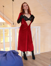 Black lingerie redhead appears very sexy in nude moms pics
