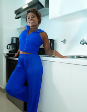 Ebony mom slowly unzips her outfit to play with her breasts