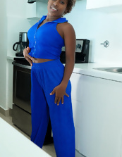 Ebony mom slowly unzips her outfit to play with her breasts