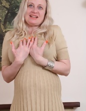 Mature blonde with blue eyes is acting like an obsessive slut