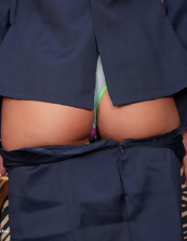 Wearing a sexy outfit and slowly taking off parts of it