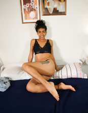 Curly Beauty Shows Hairy Pussy