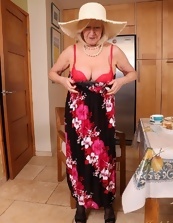 Mature Lady In Floral Dress Strip