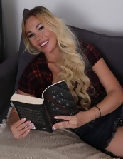 Blonde Milf Stripping On Sofa