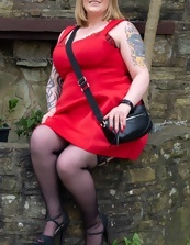 Mature Babe Teases In Red Dress