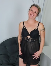 Mature Tease In Black Lingerie