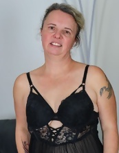 Mature Tease In Black Lingerie