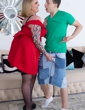 Tattooed Milf Seduces Young Stud