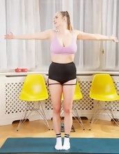 Curvy Milf In Workout Strip Photos