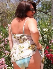 Busty Mature Nude In Garden Photos