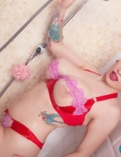 Tattooed Babe Shower Tits And Toy Tease Pics