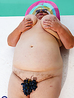BBW granny by pool flashing hairy pussy in sun