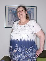 Granny nude with bushy pussy and saggy tits spreading legs in solo tease