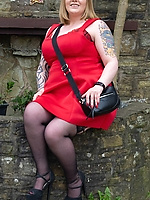Red dress milf flaunts her ass and lingerie
