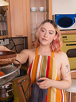 Alt chick with a slender body is toying with her bushy cunt