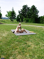 Hairy pussy licking on the blanket in sunshine