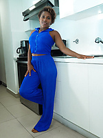 Ebony mom slowly unzips her outfit to play with her breasts