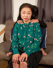 Mature Asian Naked Woman Kneeling Tits