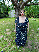 Mature busty woman outdoors teasing with saggy tits and big booty