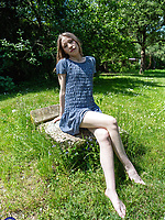Clothed babe outdoor solo tease with dress lifted for bare ass out