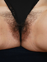Mature nude solo tease spread pose shows hairy pussy and natural tits